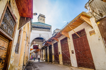 Empty street of old Medina in Fes, Morocco during Eid Al Adha with closed shops © marketanovakova