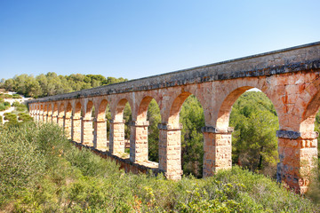 Fototapeta na wymiar A part of the Roman aqueduct built to supply water to the ancient city of Tarraco - now Tarragona, Spain.