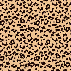 Vector seamless background with leopard spotty ornament, wallpaper, pattern  ideal for textile designs