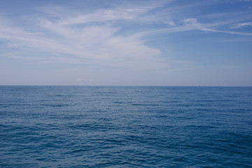 Beautiful blue ocean and soft sky background