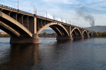 Fototapeta na wymiar Krasnoyarsk Russia, bridge over Yenisei River in late afternoon