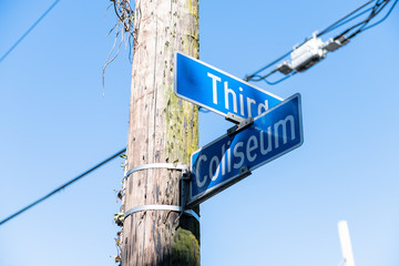 Street road sign for Coliseum and Third streets in New Orleans, Lousiana of Garden District