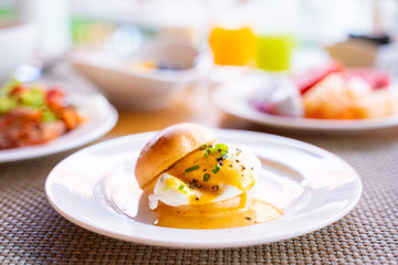 egg benedict with bread for breakfast
