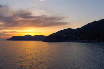 Fototapeta na wymiar sunset ocean on cinque terre, italy