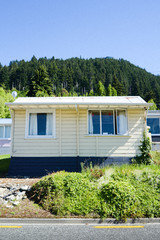 Fototapeta na wymiar Small House on Street in New Zealand