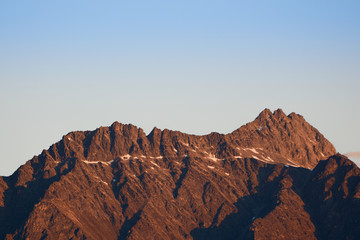 Fototapeta na wymiar Mountain Range in New Zealand at Sunset