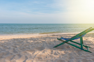 empty wooden beach chair at the beach