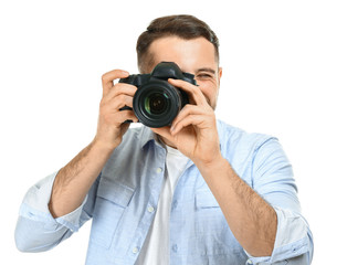 Fototapeta premium Handsome male photographer on white background