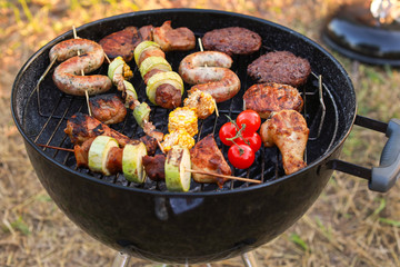Cooking of tasty food on barbecue grill outdoors