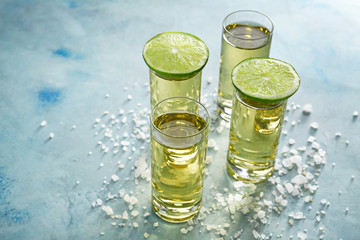 Shots of tequila on table