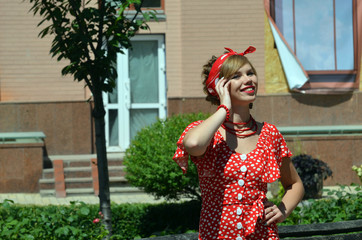 Outdoor portrait of young beautiful girl , background city street, architecture