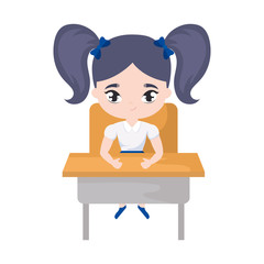 little student girl sitting in school desk