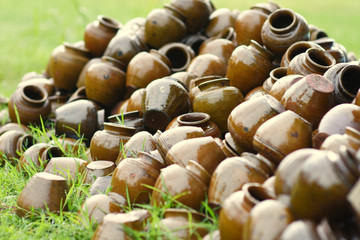 Many earthen pots,Jars on the ground.