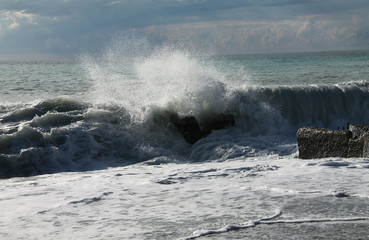 waves crashing on rocks