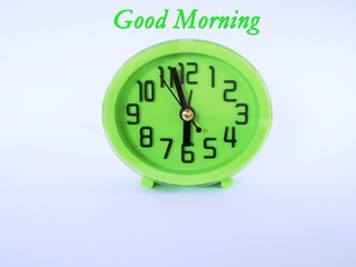 green clock isolated on white background