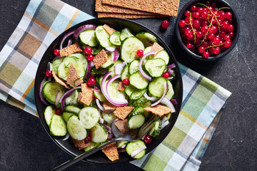 portion of delicious summer salad of cucumber