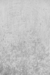 Obraz premium monochrome background of peeling paint wall. Black and white background with paint removed from the wall. Monochrome peeling wall texture