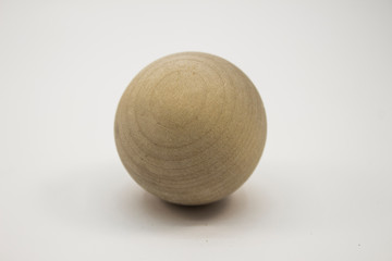 round wooden ball on a white background