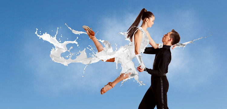 Pair of dancers dancing ballroom