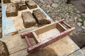 Amateur production of bricks. Ancient methods of making clay blocks.