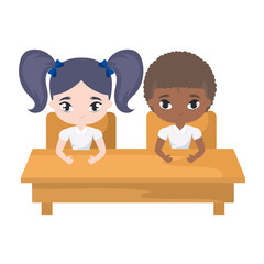 little students seated in school desk