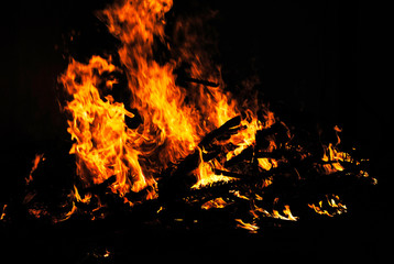 Fototapeta na wymiar Bonfire with orange flames, Alibag, costal town, Maharashtra.