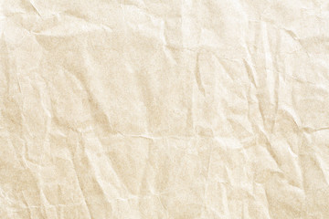 Old pale yellow crumpled paper background texture