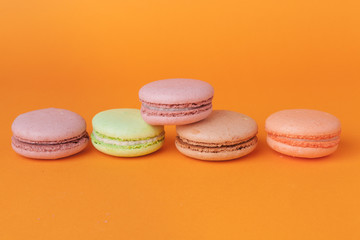 Close up colorful macarons dessert with vintage pastel tones