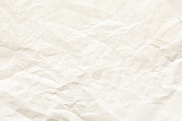 Old pale yellow crumpled paper background texture