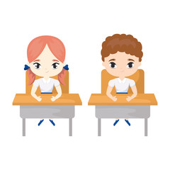 little students seated in school desks