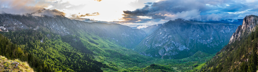 Fototapeta premium Montenegro, XXL landscape panorama from aerial view over tara river canyon landscape at dawn from mountain peak in durmitor national park near zabljak