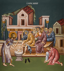 Jesus washes feet to his disciples