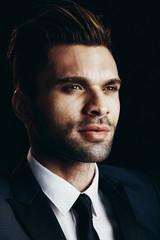 Portrait of handsome man. Black backgraund.