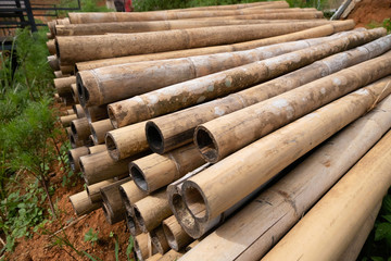 brown bamboo pile prepare for construction building materials
