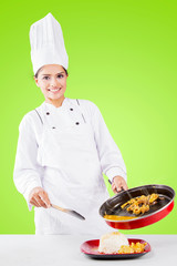 Female chef pouring tripe soup into a plate