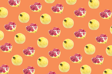 Fruit pattern of Pomegranates on Orange background. 
