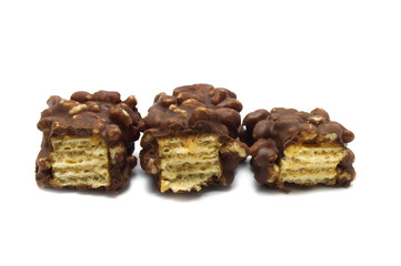 Cracked crispy wafers chocolate isolated on white background.