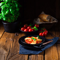 ravioli alla genovese with basil tomato sauce