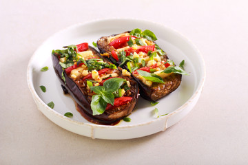 Eggplant stuffed with cheese and tomato