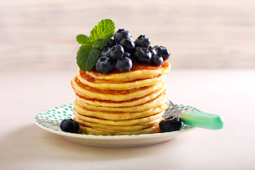 Pancakes with blueberry on top