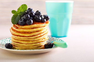Pancakes with blueberry on top