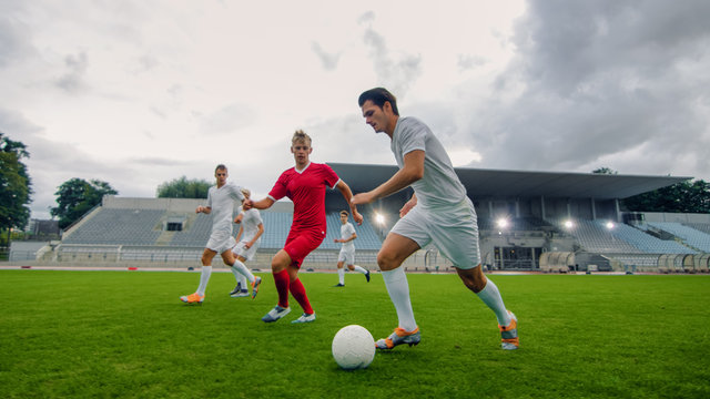 Soccer Player Receives Successful Pass And Kicks Ball To Score Amazing Goal  Doing Bicycle Kick Shot Made On A Stadium Championship Stock Photo -  Download Image Now - iStock
