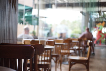 Blurred background at modern restaurant interior of a cafe.