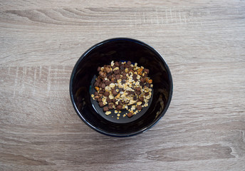 oatmeal in a bowl with chocolate on a table