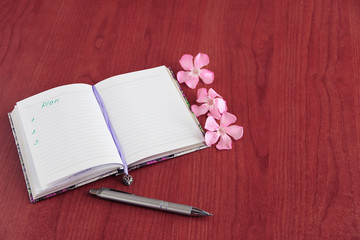 Notebook for business and notes with white pages and pencil, penster