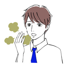 口臭を気にする男性