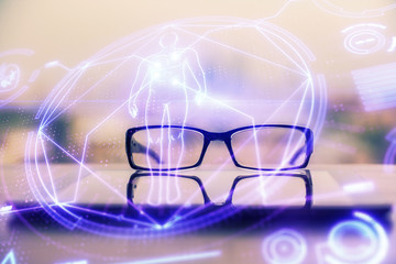Science drawing with glasses on the table background. Concept of education. Double exposure.