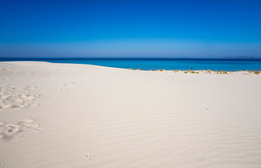 Fototapeta na wymiar white sand dunes of Is Arenas and blue sea in Sardinia