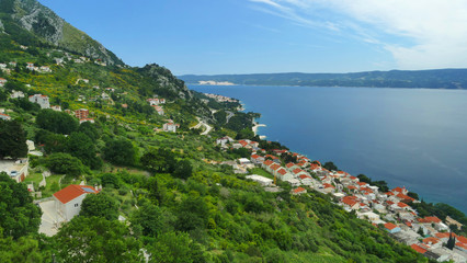 Fototapeta na wymiar Panorama view of Makarska Riviera Coast with channel near Omis, Croatia