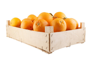 Orange fruits in wooden box isolated